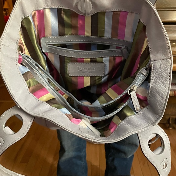 Great condition with clean divided interior. Has zippered compartments. - Picture 4 of 5